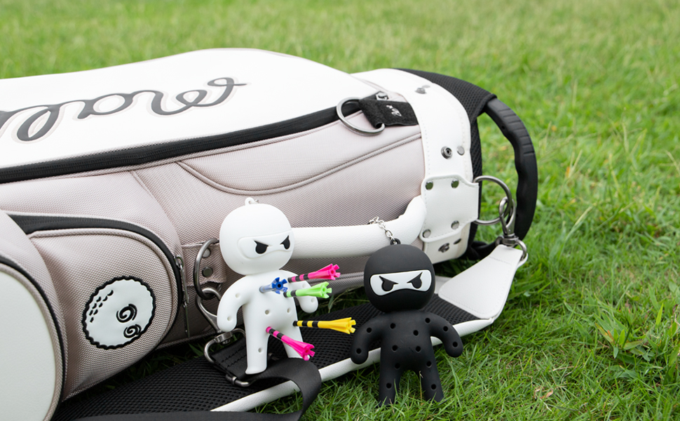 Ninja Charms attached to golf bag outdoors
